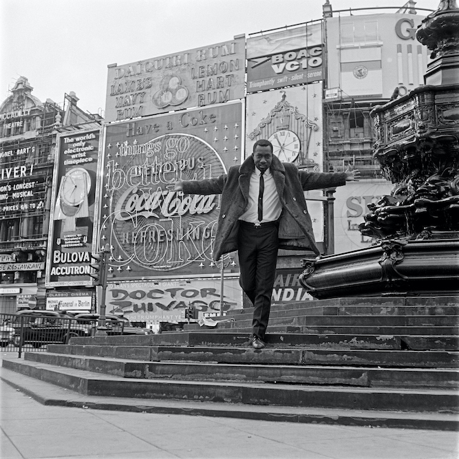 Mike Eghan Jr. first black DJ in London, at Piccadilly Circus.