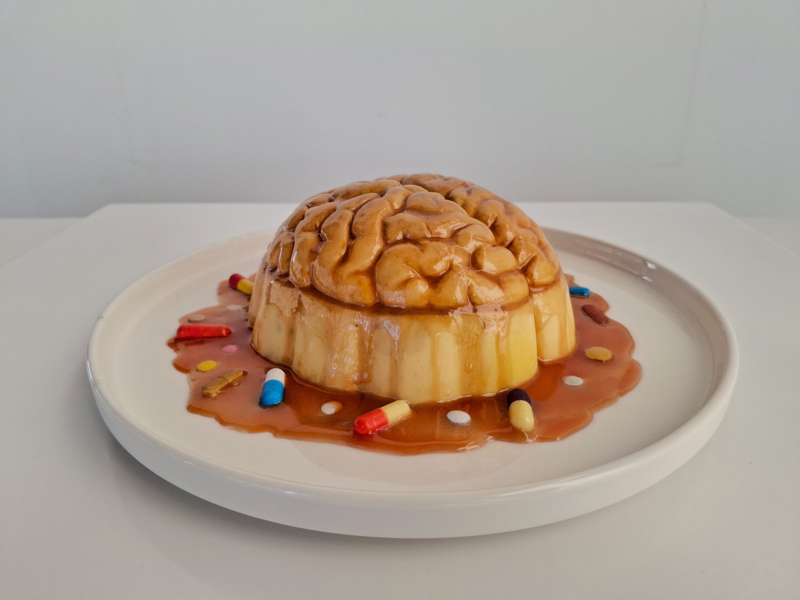 Leandro Erlich, Flan, 2026, casted resin, ceramic, 12x26x26 cm_Courtesy of Associazione Arte Continua (2)